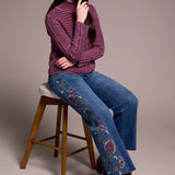 Indulge in cozy comfort with this warm sweater featuring a mock neckline and long sleeves for full coverage. Crafted from soft cotton yarn and finished with a vintage wash, it exudes timeless charm. The loose fit and drop shoulder create a relaxed silhouette, making it perfect for effortless, laid-back style.