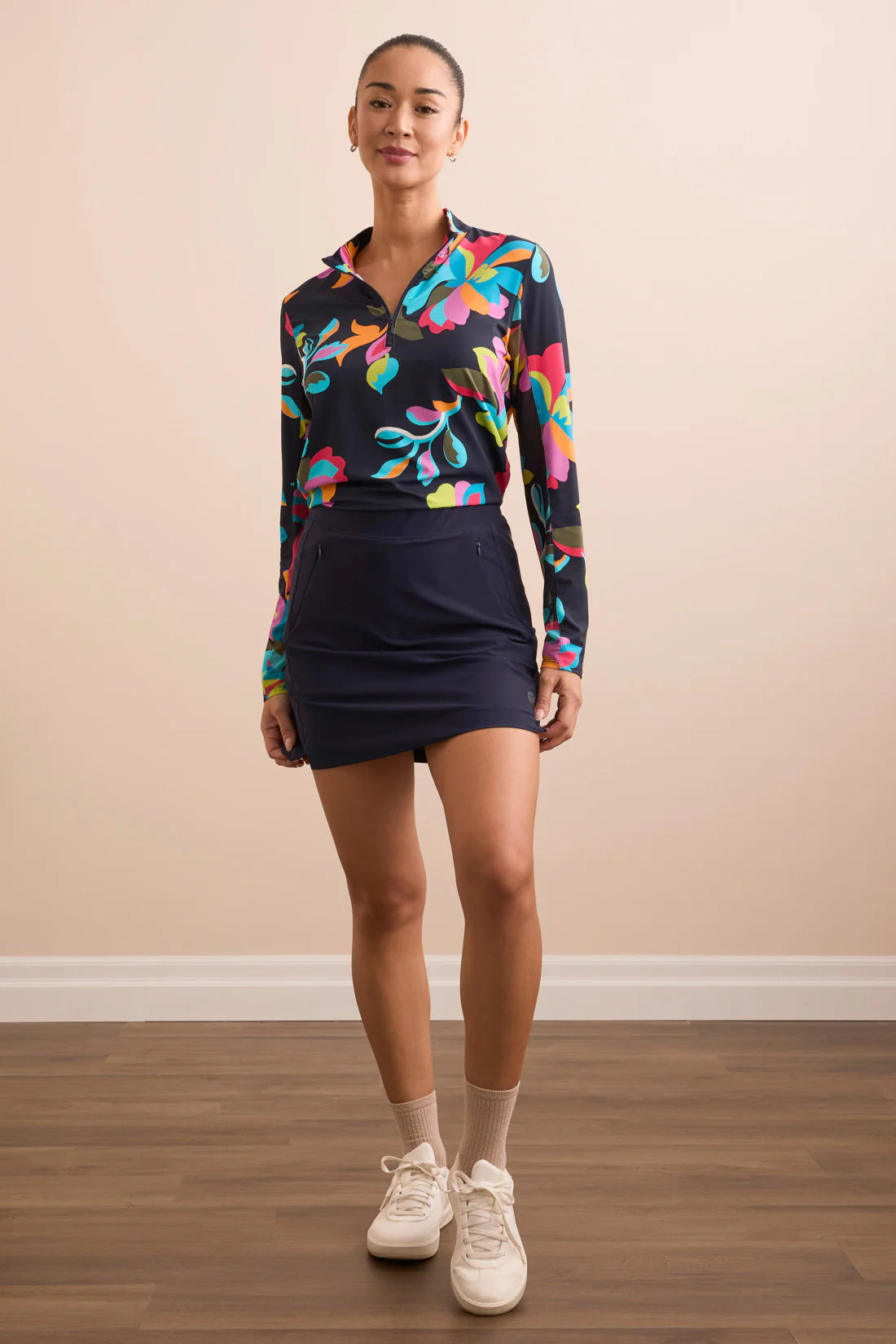 Crafted from 4-way stretch material, this straight skort hugs your form and moves effortlessly with you. A knit inner short provides comfortable coverage, while front and back pockets offer practical storage. Additionally, front zip pockets enhance security for your essentials.