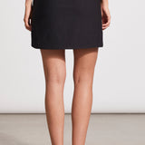 Get a sophisticated look that offers undercover comfort with this pull-on skort. It's a must-have staple that comes together with a faux wrap design, built-in shorts, functional pockets in the front and back, decorative cord piping, 18" length, and stretch twill fabric that adds extra flexibility.