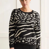 A reversible design makes this sweater the most versatile piece in your closet. 