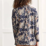 Reinvigorate your regular rotation with this long-sleeve top showcasing a vivacious selection of prints that'll put you at the center of attention