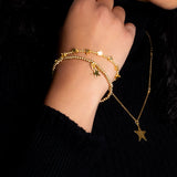 Suzie Blue Elasticated Star Charm Bracelet In Gold Plate