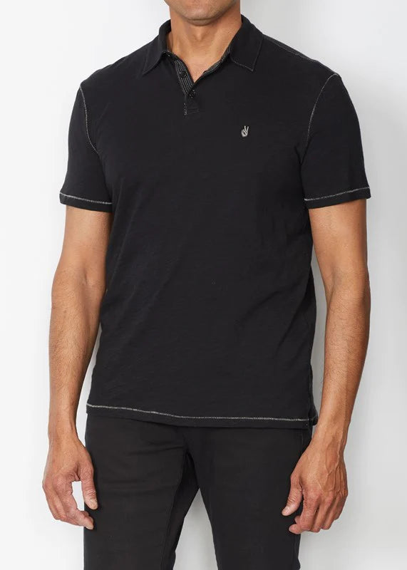 Our signature Peace Polo keeps things cool year-round. Cut from a lightweight, soft cotton, it features a three-button placket and peace sign chest embroidery.