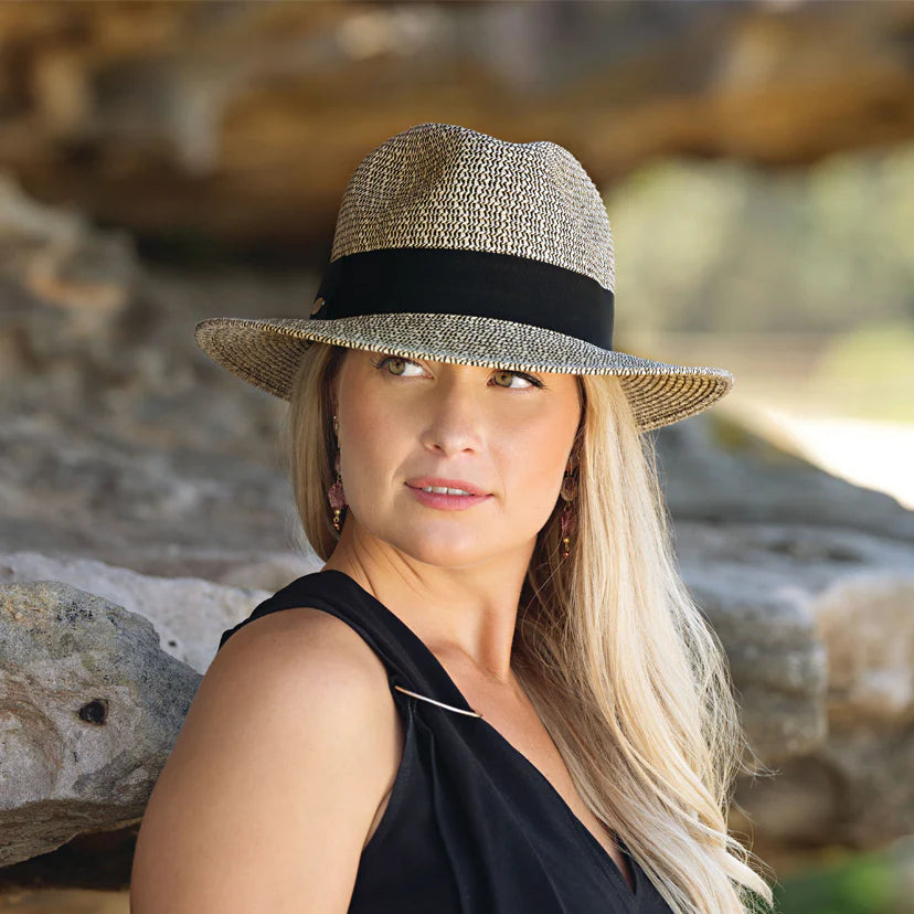 The Josie sun hat features a classic fedora style with a 3″ wire-edged brim and a black ribbon band.